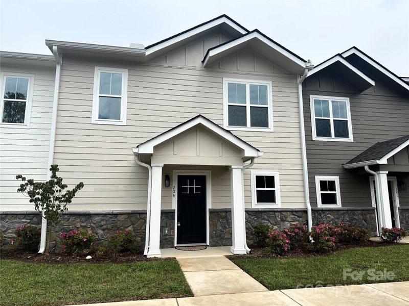 Front exterior of a new home in , Morganton, NC, highlighting curb appeal (Image 1). Front exterior of a new home in , Morganton, NC, highlighting curb appeal (Image 1).