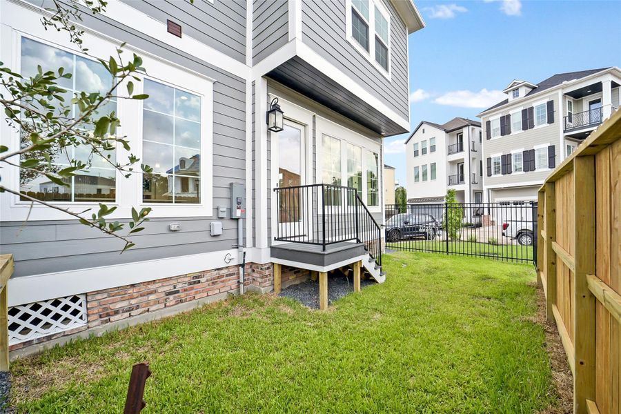 Exterior details and patio area of a home in Reserve in Memorial, Houston (Image 26). Exterior details and patio area of a home in Reserve in Memorial, Houston (Image 26).