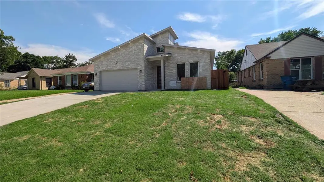 Front exterior of a new home in , Dallas, TX, highlighting curb appeal (Image 2). Front exterior of a new home in , Dallas, TX, highlighting curb appeal (Image 2).
