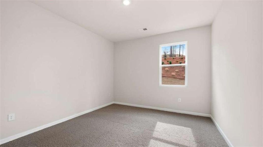 Spacious, unfurnished interior of a new home in Brooks Station, Dacula (Image 29).