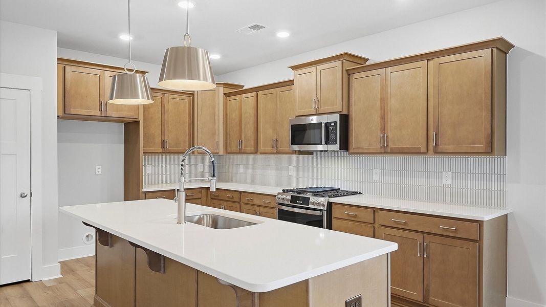 Well-designed kitchen with a center island and tasteful finishes that elevate everyday living in Piedmont, SC
