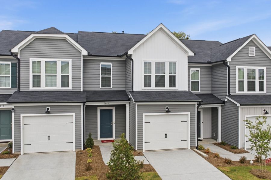 Front exterior of a new home in Carpenter Falls, Durham, NC, highlighting curb appeal (Image 23).