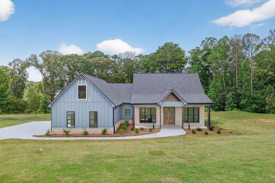 Front exterior of a new home in , Dallas, GA, highlighting curb appeal (Image 26). Front exterior of a new home in , Dallas, GA, highlighting curb appeal (Image 26).