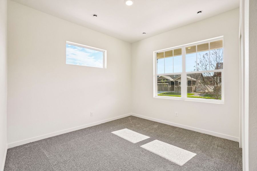 Spacious, unfurnished interior of a new home in Union Colony West, Greeley (Image 43).