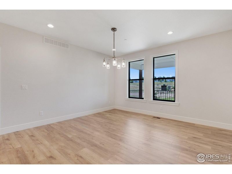 Spacious, unfurnished interior of a new home in Cottages at Kelly Farm, Greeley (Image 32).