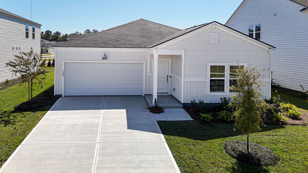 Front exterior of a new home in The Preserve, Hardeeville, SC, highlighting curb appeal (Image 1). Front exterior of a new home in The Preserve, Hardeeville, SC, highlighting curb appeal (Image 1).
