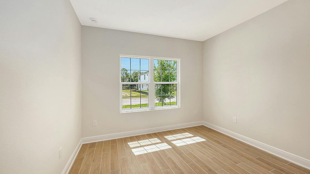 Spacious, unfurnished interior of a new home in Grand Park Real Estate and Homes for Sale in Sarasota, FL - Neal Communities, Sarasota (Image 44).