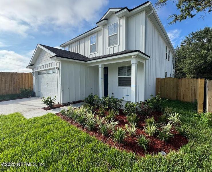 Front exterior of a new home in , Atlantic Beach, FL, highlighting curb appeal (Image 1). Front exterior of a new home in , Atlantic Beach, FL, highlighting curb appeal (Image 1).
