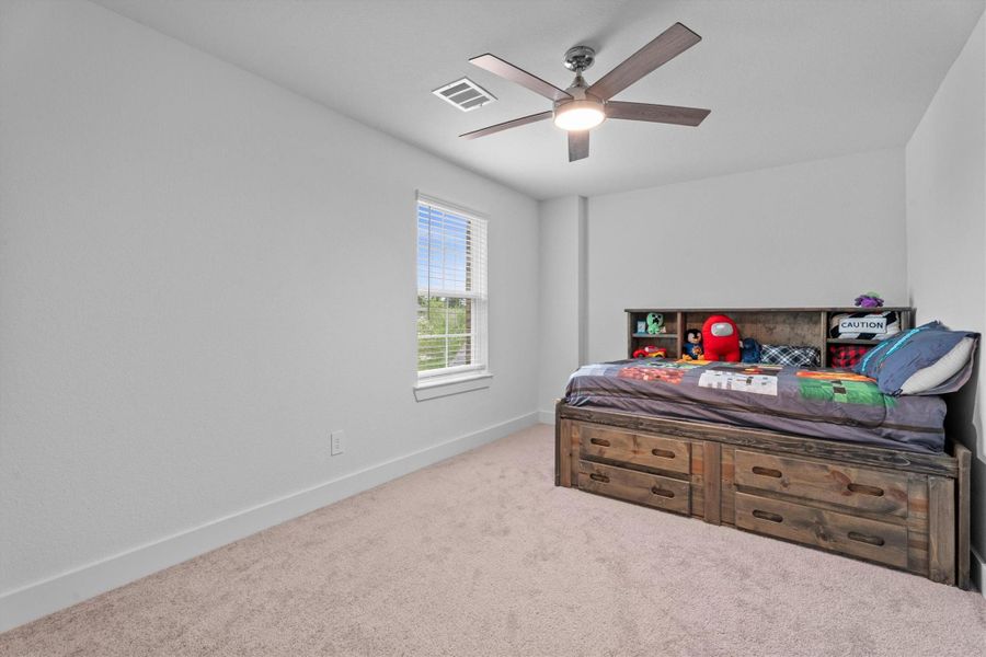 Furnished interior view inside a new home in Sorella, Tomball (Image 40).