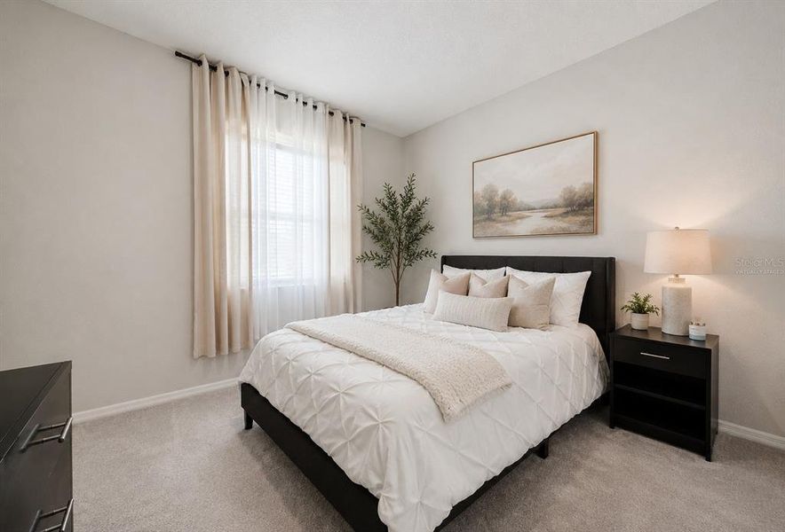 Furnished interior view inside a new home in Towns at Woodsdale Villas, Wesley Chapel (Image 8).