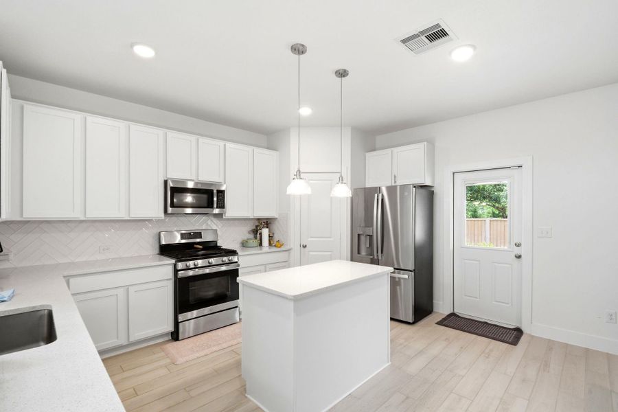 Furnished interior view inside a new home in Massey Oaks, Pearland (Image 16).