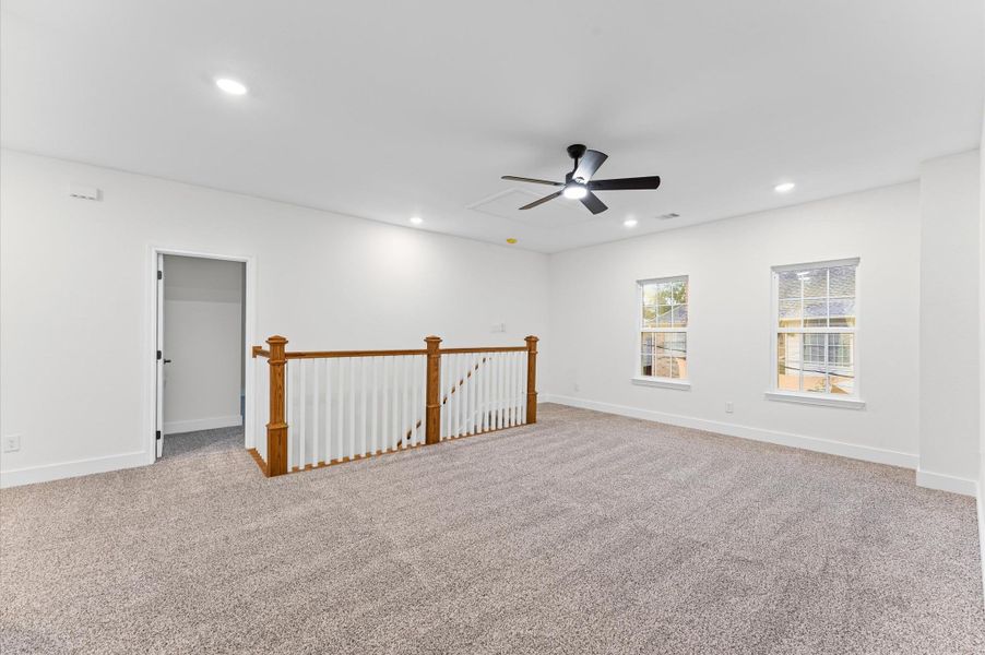 Expansive upstairs game room offering plenty of space for a media setup, kids’ play area, or a home office — designed for versatility and comfort. Expansive upstairs game room offering plenty of space for a media setup, kids’ play area, or a home office — designed for versatility and comfort.