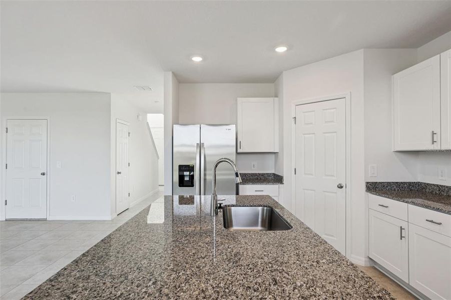 Furnished interior view inside a new home in Lake Deer Estates - Signature Series, Poinciana (Image 10).