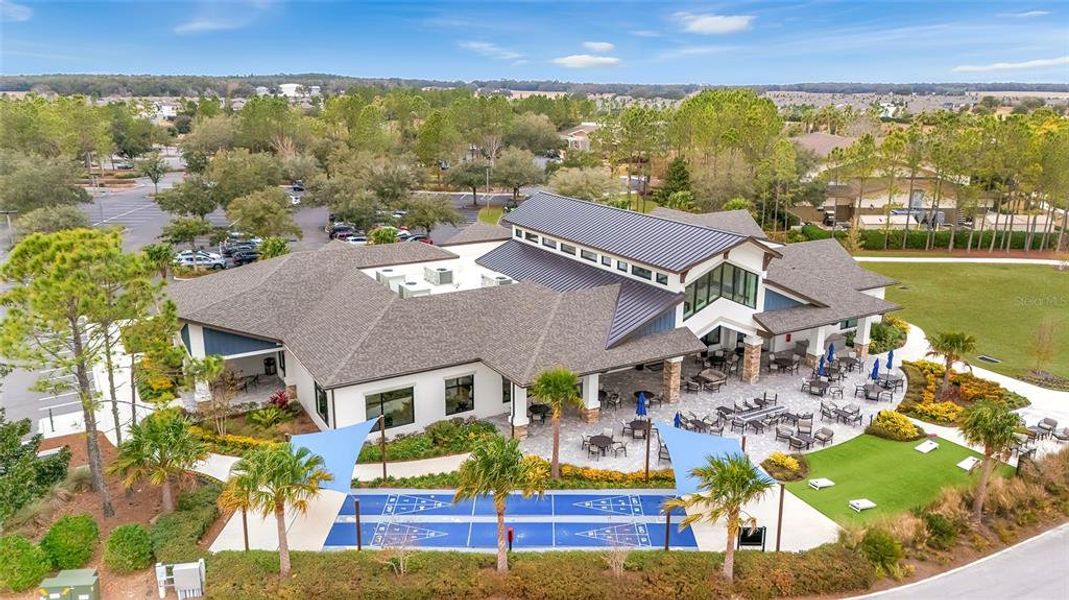 Front exterior of a new home in Del Webb Stone Creek, Ocala, FL, highlighting curb appeal (Image 24). Front exterior of a new home in Del Webb Stone Creek, Ocala, FL, highlighting curb appeal (Image 24).