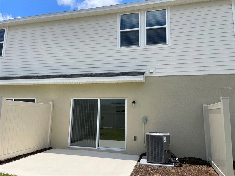 Exterior details and patio area of a home in Seasons at Big Sky, Kissimmee (Image 20).