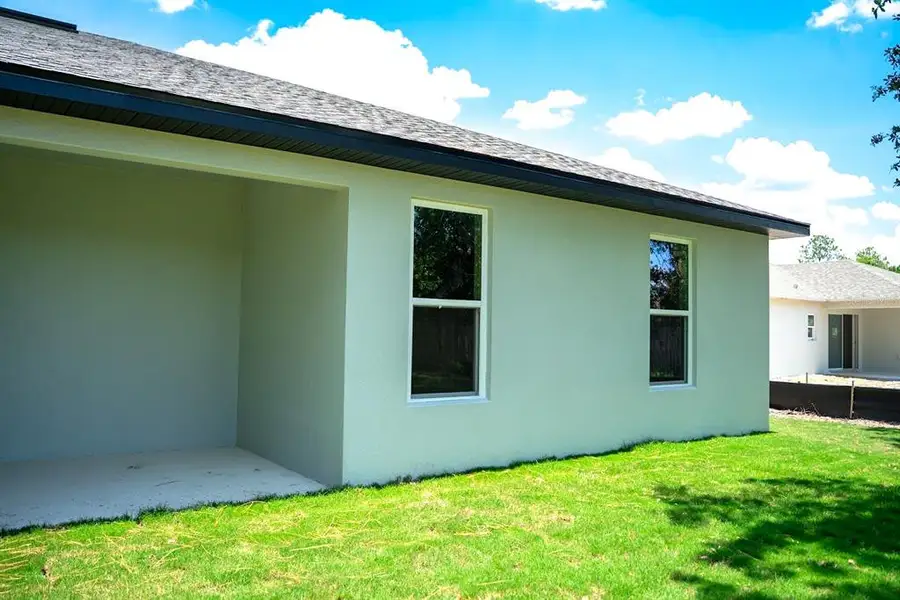 Exterior details and patio area of a home in Palm Coast, Palm Coast (Image 3).