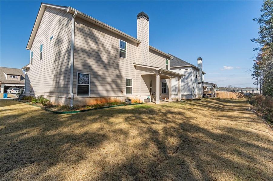 Exterior details and patio area of a home in Enclave at Brookside Crossing, Auburn (Image 23).