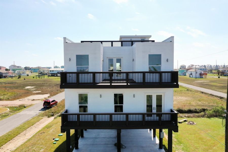 Front exterior of a new home in , Galveston, TX, highlighting curb appeal (Image 1). Front exterior of a new home in , Galveston, TX, highlighting curb appeal (Image 1).