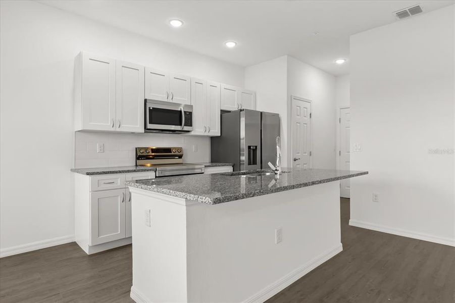 Furnished interior view inside a new home in , Clermont (Image 6). Furnished interior view inside a new home in , Clermont (Image 6).