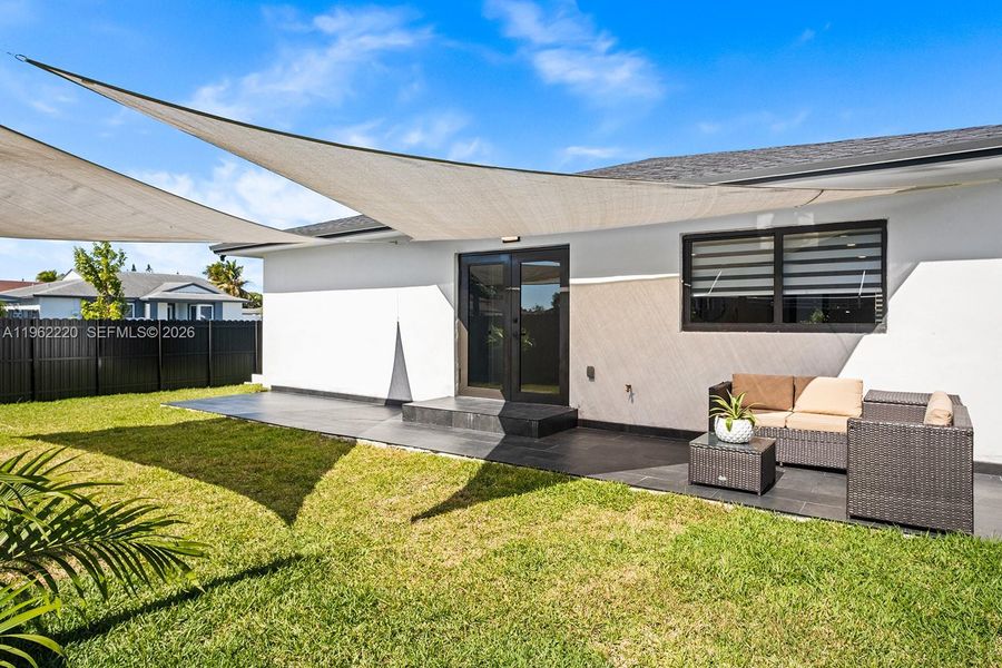 Exterior details and patio area of a home in , Miami (Image 24). Exterior details and patio area of a home in , Miami (Image 24).