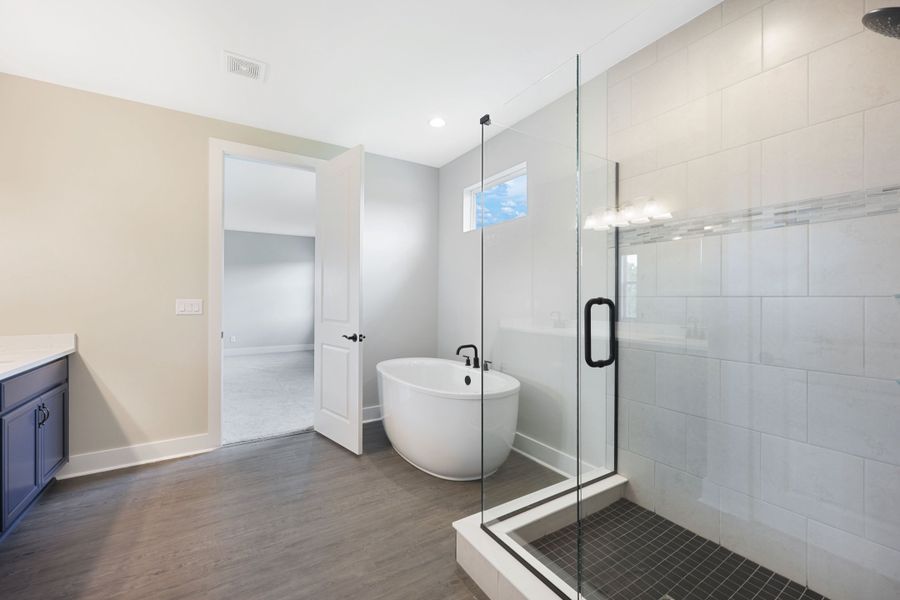 Representative furnished interior of a home built from the Jupiter by William Ryan Homes in The Sanctuary – Royal Collection, Punta Gorda (Image 9).