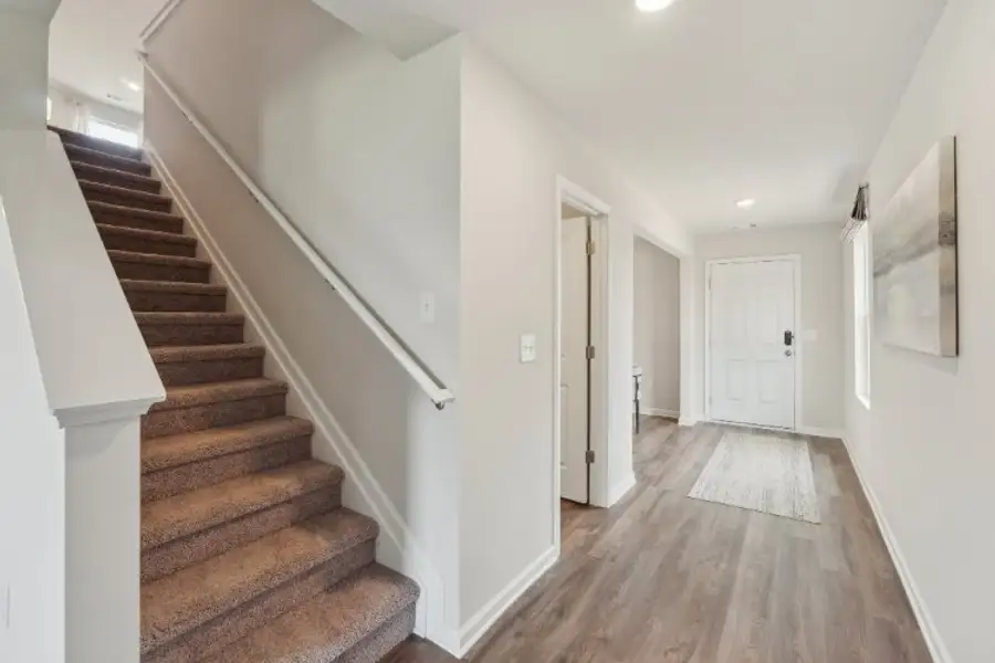 A staircase in a house. A staircase in a house.