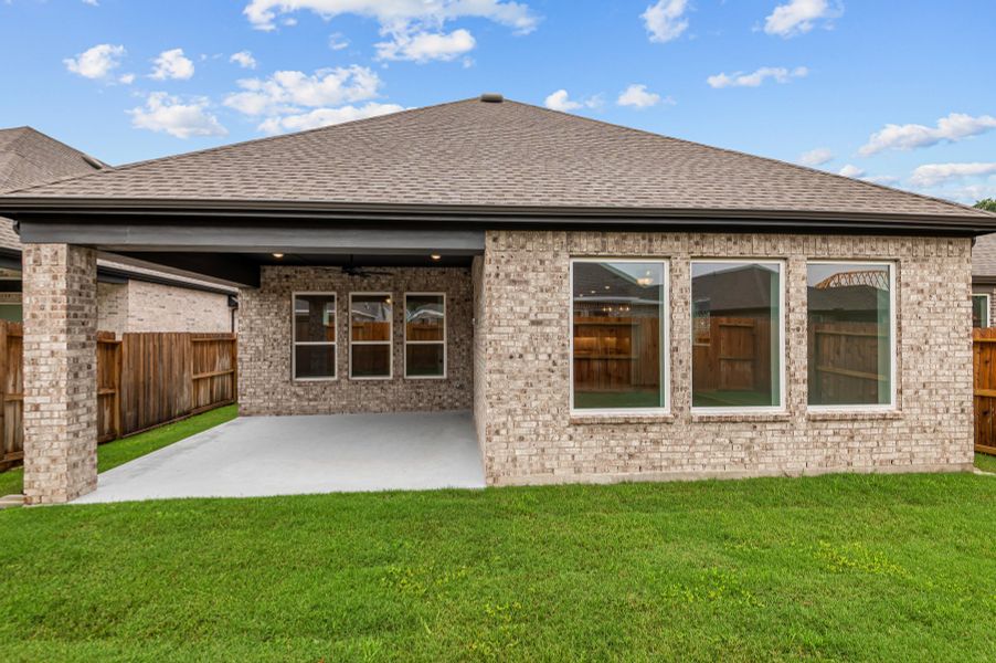 Exterior details and patio area of a home in The Highlands 45' - Encore Collection, Porter (Image 2). Exterior details and patio area of a home in The Highlands 45' - Encore Collection, Porter (Image 2).