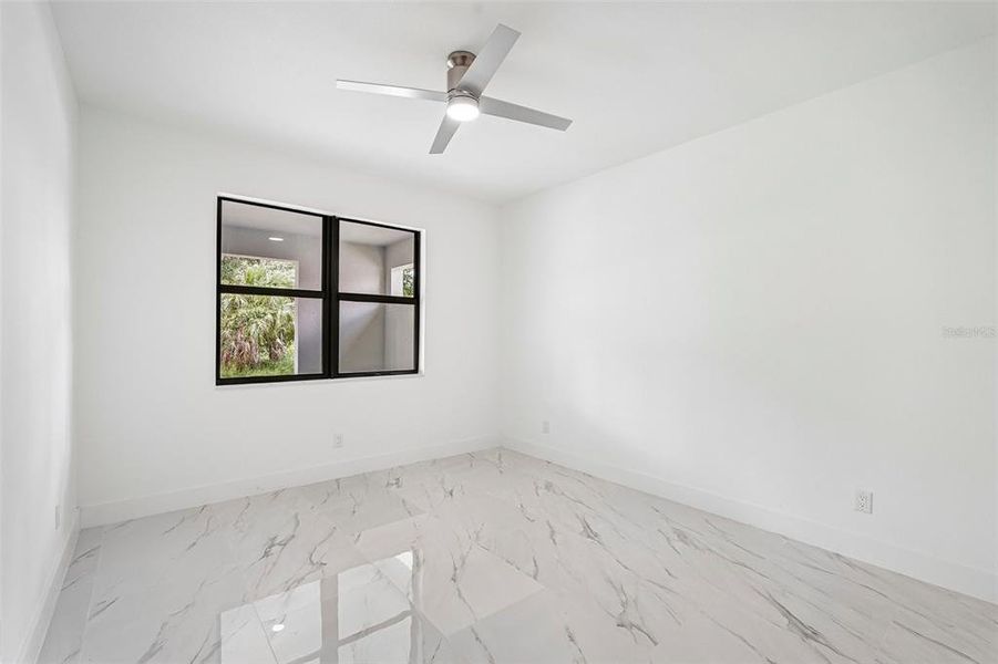 Spacious, unfurnished interior of a new home in , Port Charlotte (Image 27).