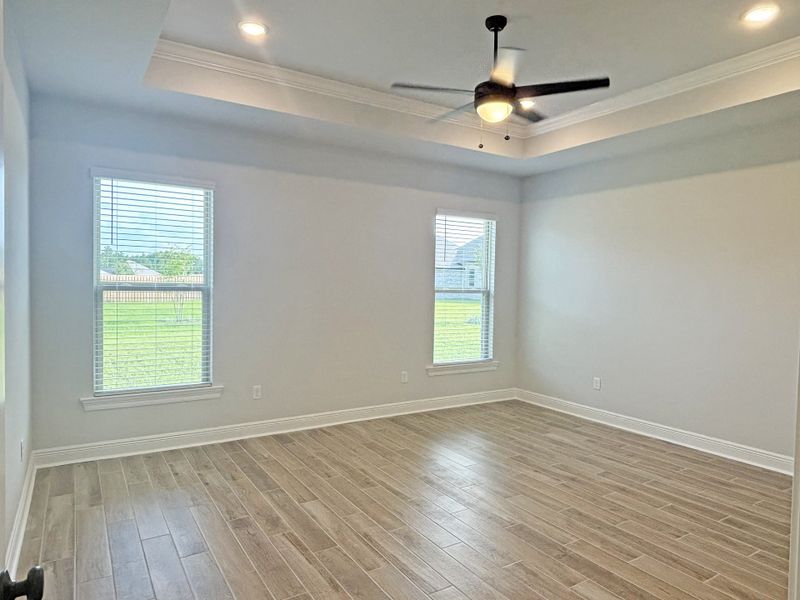 Spacious, unfurnished interior of a new home in Bird Song at Hammock Bay, Freeport (Image 19).