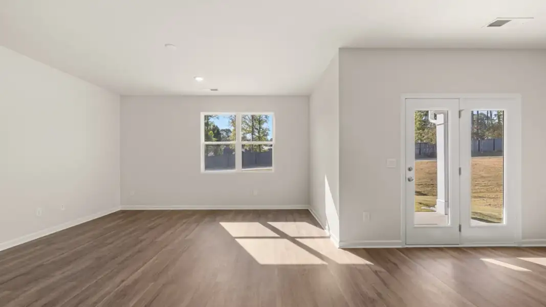 Representative unfurnished interior of a home built from the Cali by D.R. Horton in Stillwater Lake Oconee, Eatonton (Image 19). Representative unfurnished interior of a home built from the Cali by D.R. Horton in Stillwater Lake Oconee, Eatonton (Image 19).