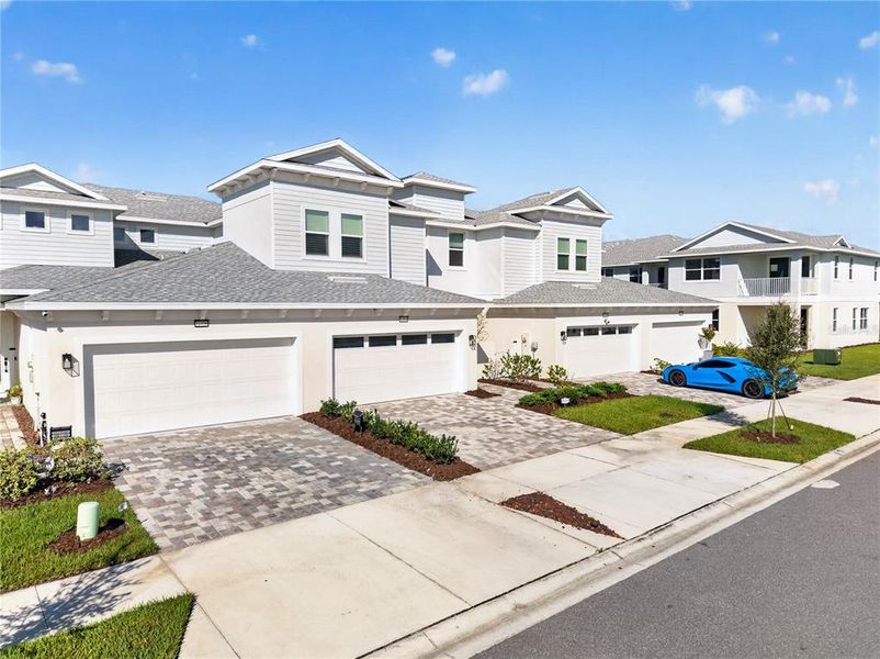 Front exterior of a new home in , Wesley Chapel, FL, highlighting curb appeal (Image 20).