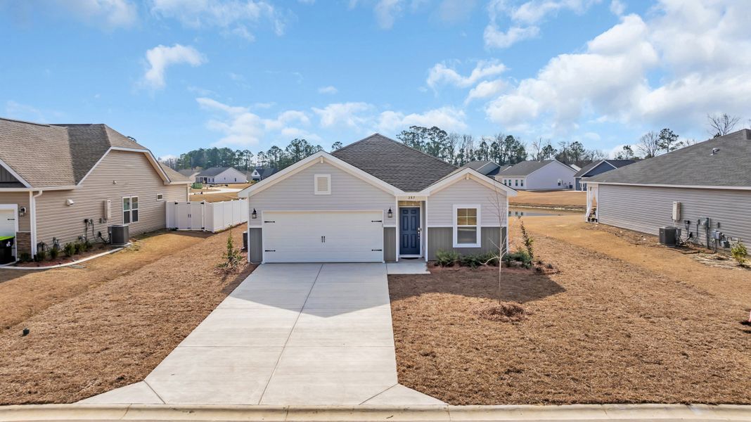 Representative exterior photo of a completed home built from the Courtney II by Great Southern Homes in Oak Hollow, Longs, SC (Image 27).