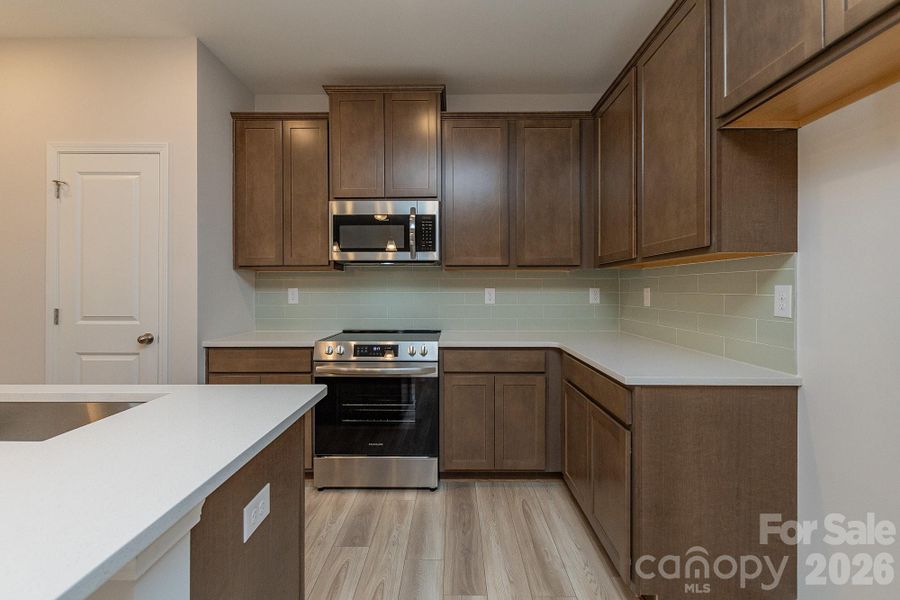 Furnished interior view inside a new home in Pine Bluff, Midland (Image 7). Furnished interior view inside a new home in Pine Bluff, Midland (Image 7).