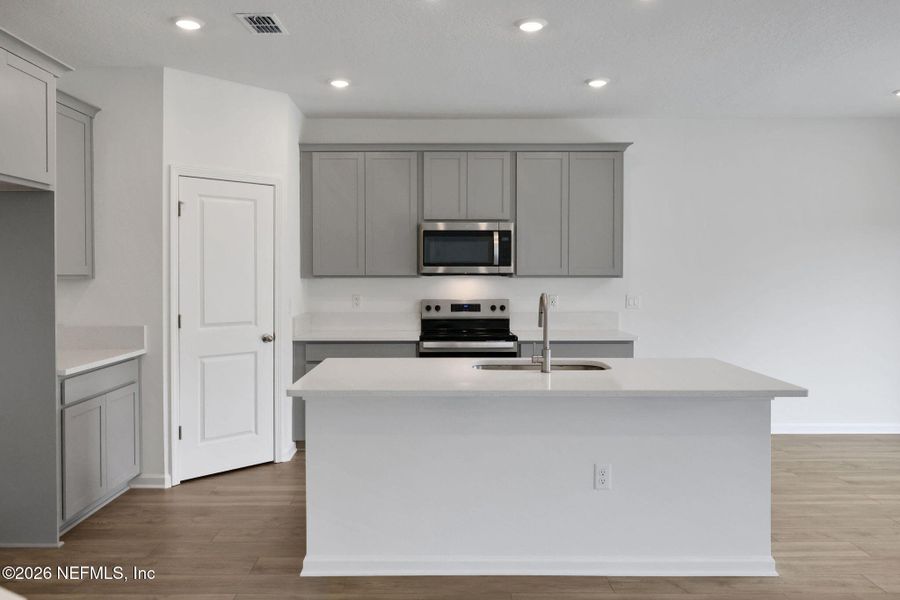 Furnished interior view inside a new home in Amberly, Green Cove Springs (Image 9).