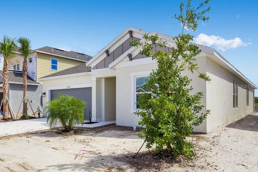 Exterior details and patio area of a home in Firethorn, Parrish (Image 3).
