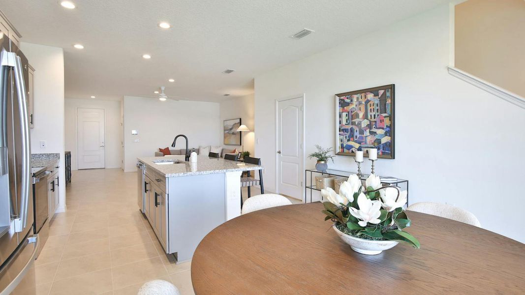 Furnished interior view inside a new home in Palm Grove Real Estate and Homes for Sale in Lakewood Ranch, FL - Neal Communities, Lakewood Ranch (Image 19).