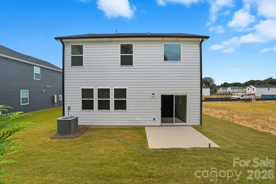 Exterior details and patio area of a home in Bellina, York (Image 20).