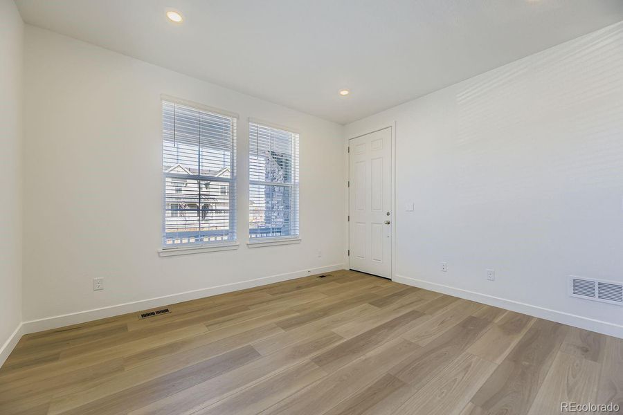 Spacious, unfurnished interior of a new home in Newlin Crossing: The Monarch Collection, Parker (Image 15).