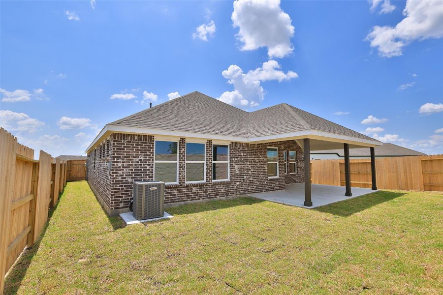 Exterior details and patio area of a home in River Ranch, Dayton (Image 3).