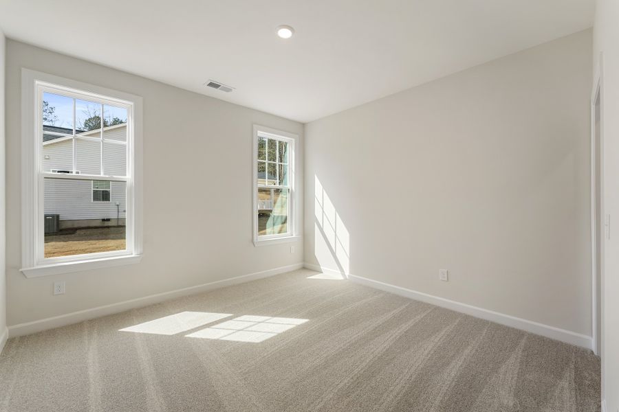 Spacious, unfurnished interior of a new home in Landing at Pine Lake, Anderson (Image 24).