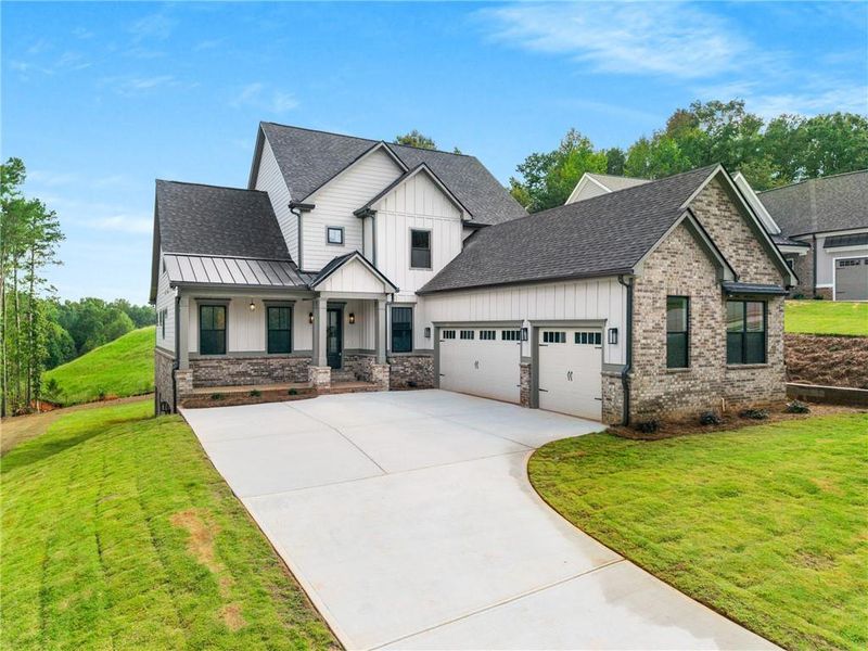 Front exterior of a new home in , Jefferson, GA, highlighting curb appeal (Image 28).