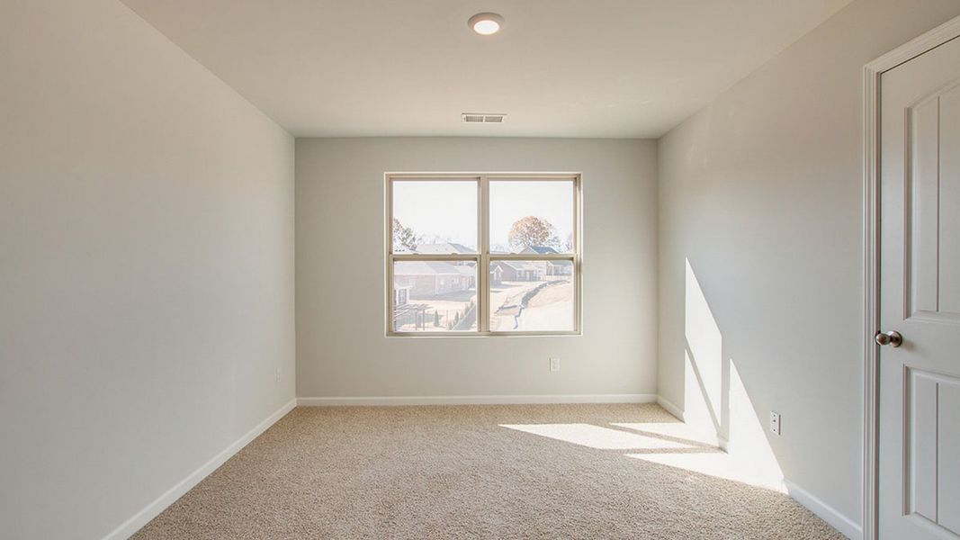 Spacious, unfurnished interior of a new home in The Parks, White House (Image 23).
