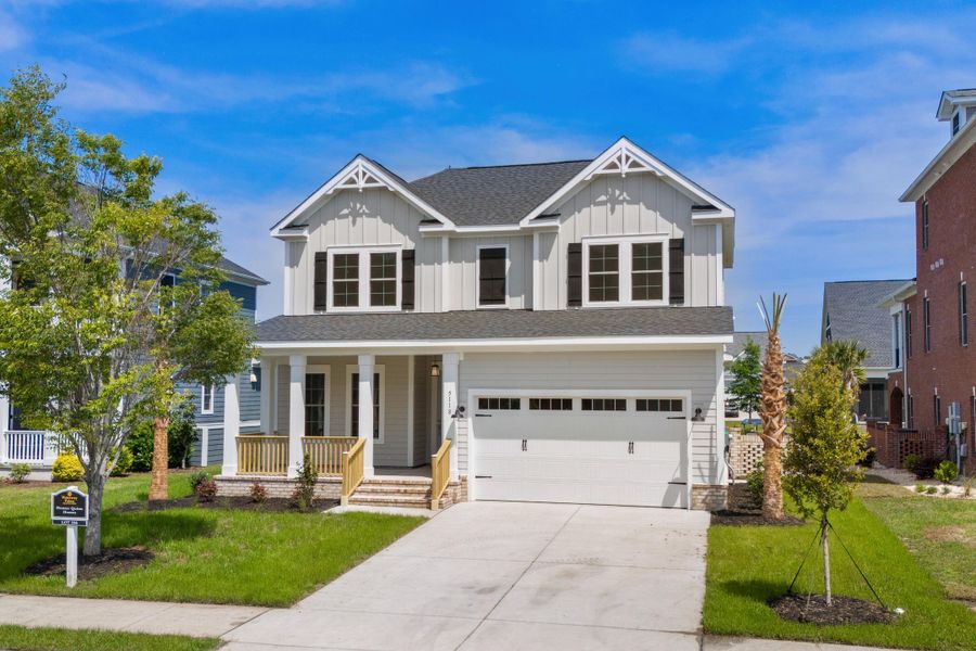 Front exterior of a new home in Creek Pointe, Moncks Corner, SC, highlighting curb appeal (Image 2). Front exterior of a new home in Creek Pointe, Moncks Corner, SC, highlighting curb appeal (Image 2).