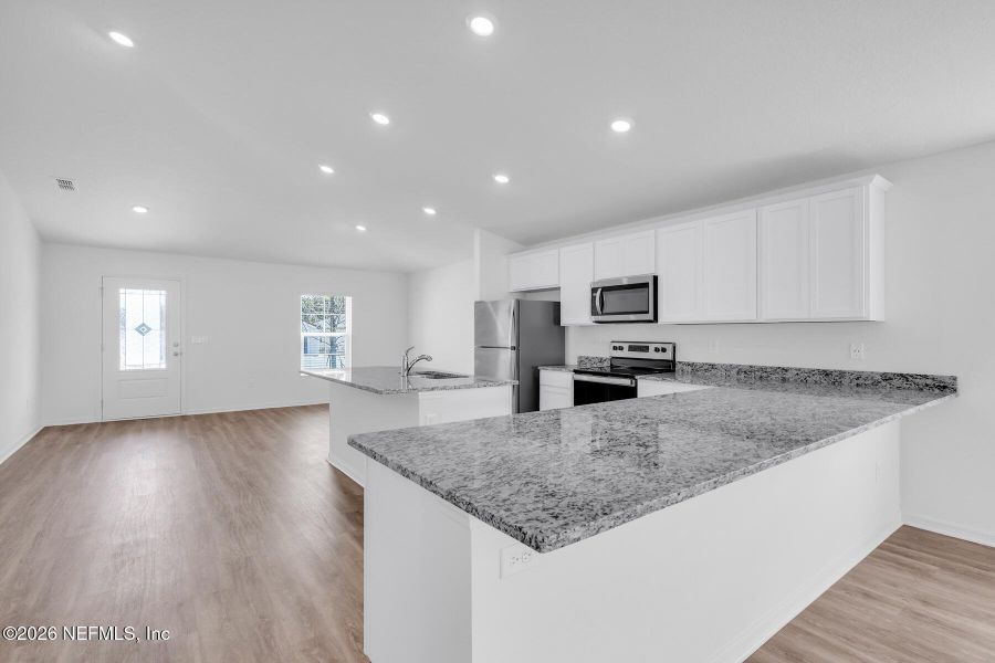 Furnished interior view inside a new home in Rolling Hills, Green Cove Springs (Image 9).