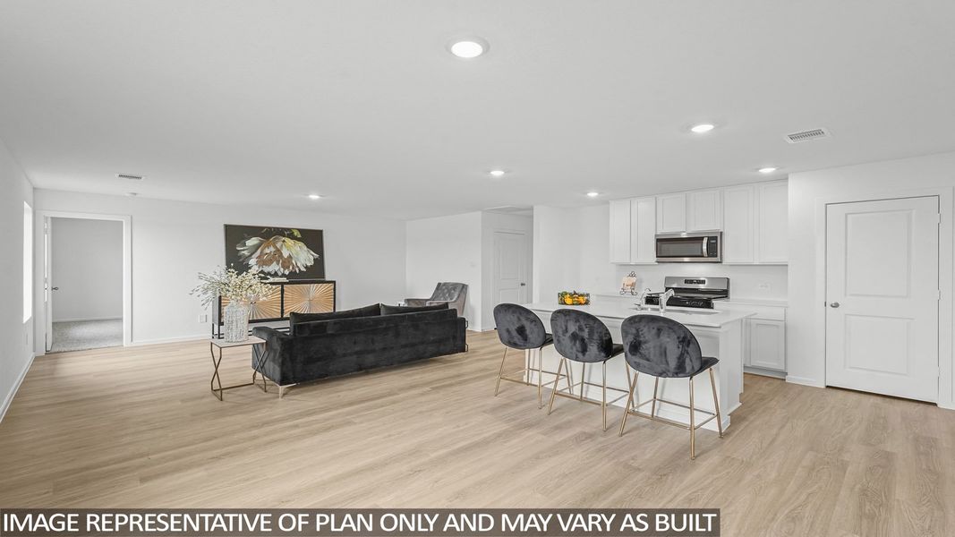 Furnished interior view inside a new home in Sunterra, Katy (Image 6).