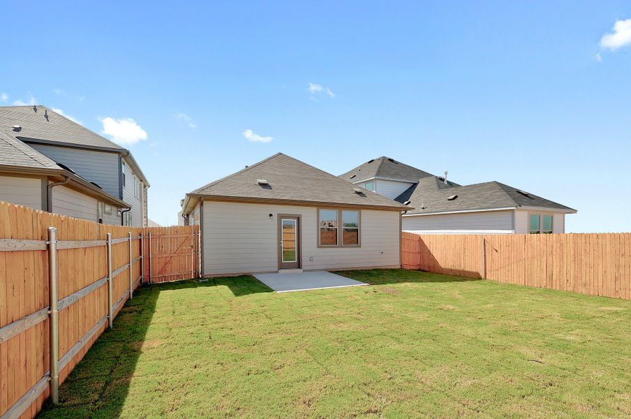 Exterior details and patio area of a home in Trinity Ranch, Elgin (Image 18).