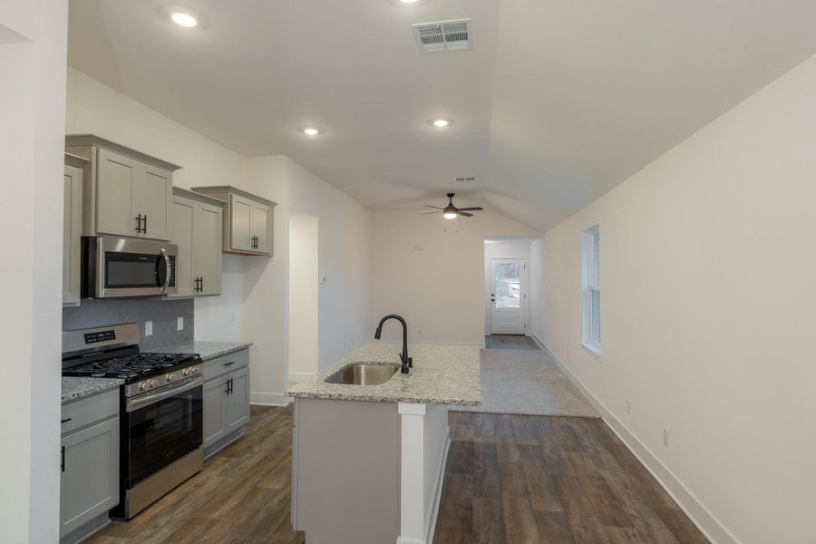 Furnished interior view inside a new home in , Conroe (Image 7).