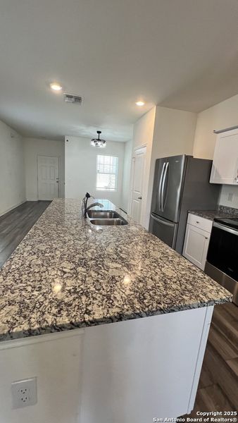 Furnished interior view inside a new home in Trails at Culebra, San Antonio (Image 3).