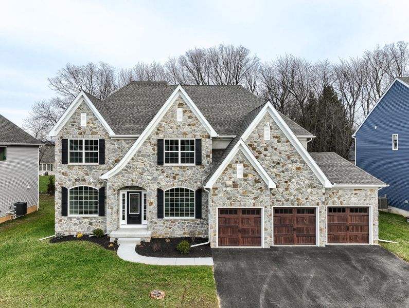 Representative exterior photo of a completed home built from the Devonshire by Keystone Custom Homes in McLean South Shore, Belmont, NC (Image 21).