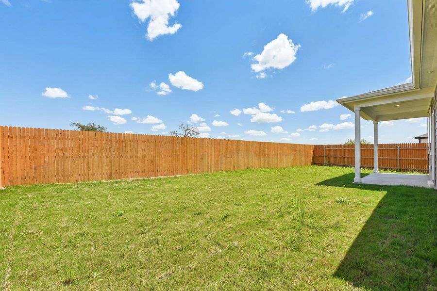 Exterior details and patio area of a home in Trinity Ranch, Elgin (Image 3).